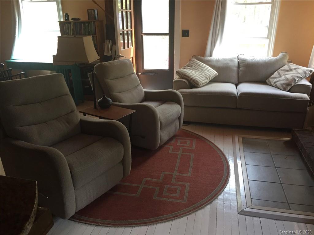84 Brahma Ridge Candler, NC 28715 - Photo 14 of 30 a living room with furniture and a window