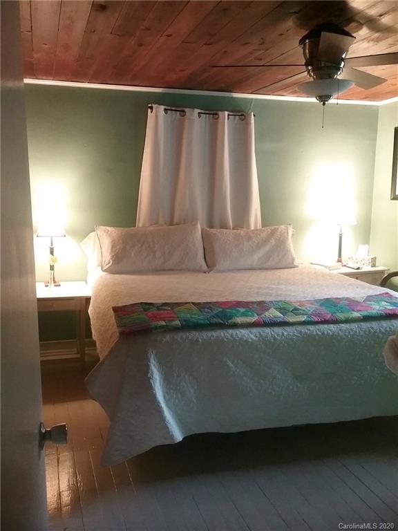 84 Brahma Ridge Candler, NC 28715 - Photo 15 of 30 a living room with a bed furniture and a window