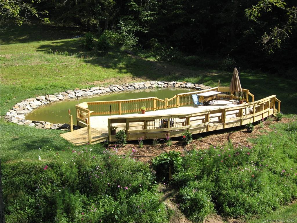 84 Brahma Ridge Candler, NC 28715 - Photo 20 of 30 a view of a swimming pool with a yard