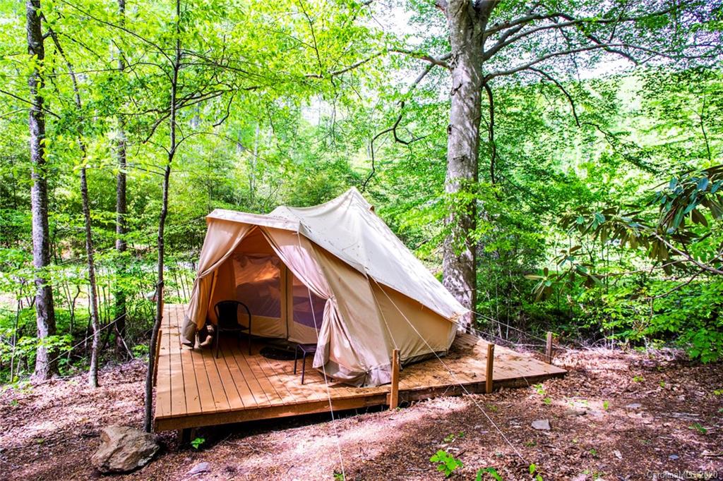 84 Brahma Ridge Candler, NC 28715 - Photo 25 of 30 a view of small house with yard and sitting area