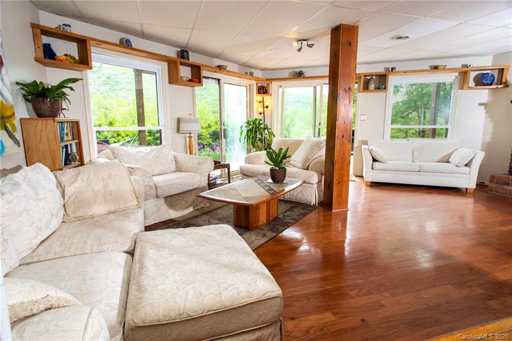 84 Brahma Ridge Candler, NC 28715 - Photo 7 of 30 a living room with furniture and a large window