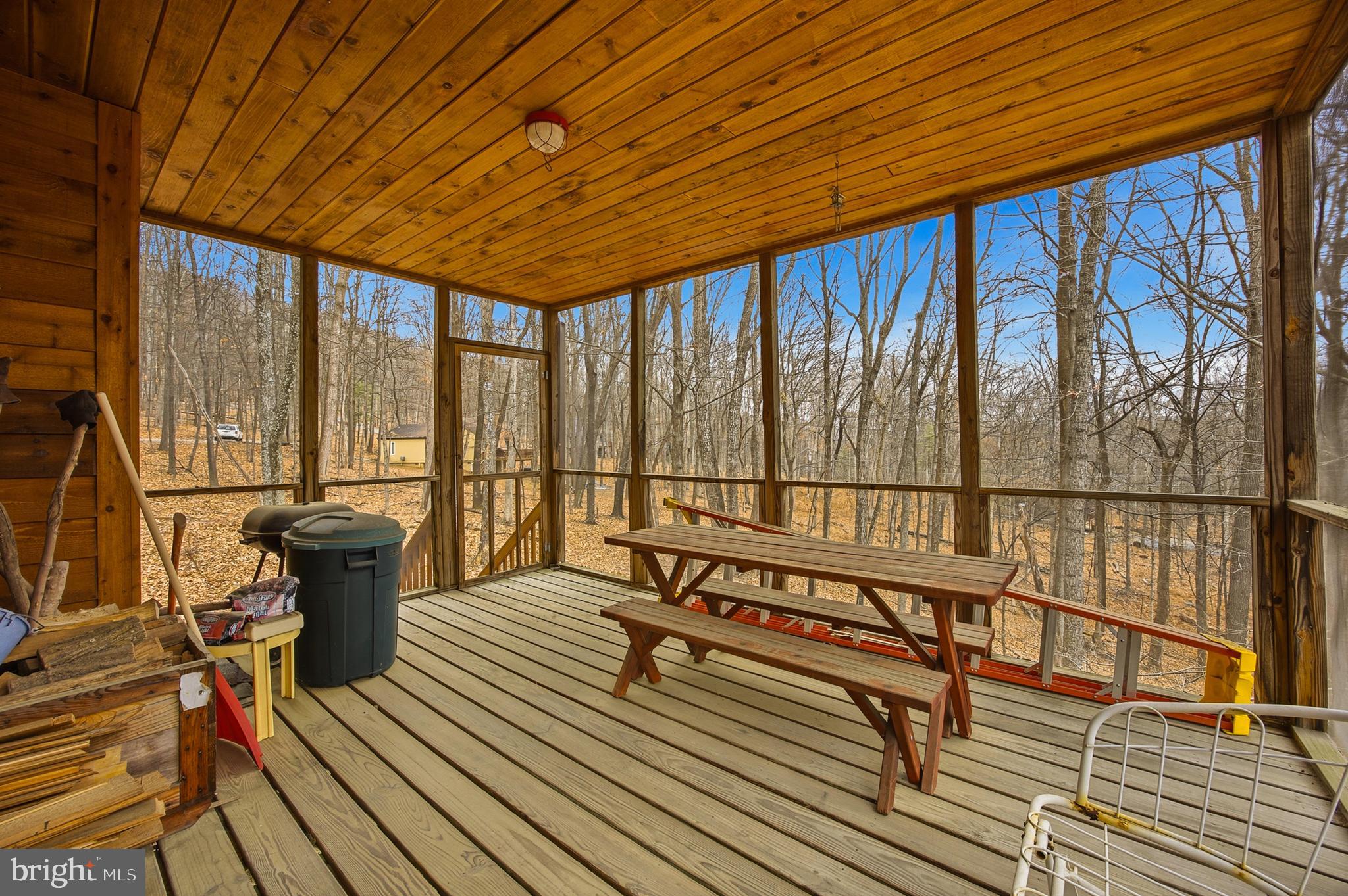 16 Gopher Trail Berkeley Springs, WV 25411 - Photo 14 of 52 a view of two chairs in the balcony