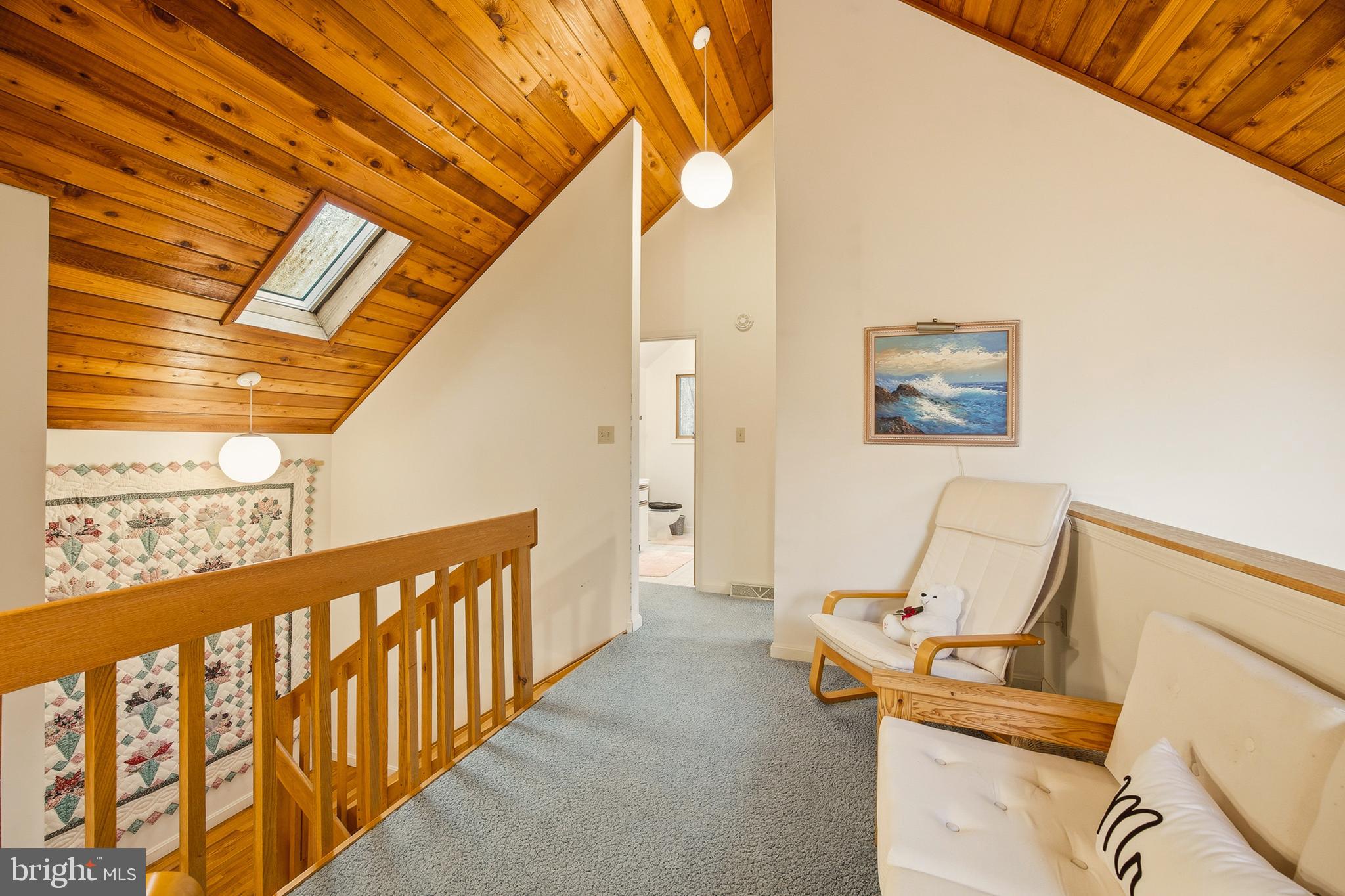 16 Gopher Trail Berkeley Springs, WV 25411 - Photo 29 of 52 a view of a hallway with workspace