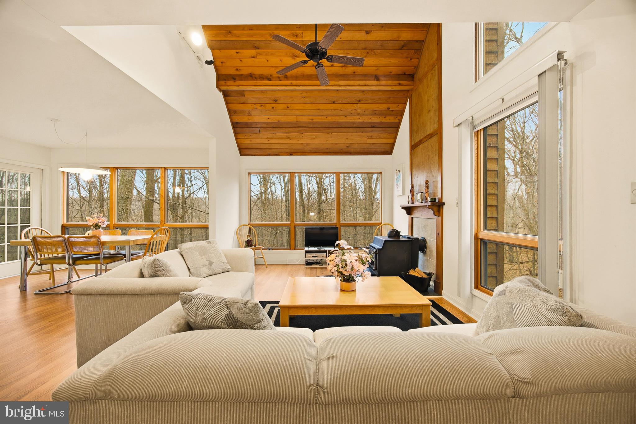 16 Gopher Trail Berkeley Springs, WV 25411 - Photo 4 of 52 a living room with furniture and floor to ceiling windows