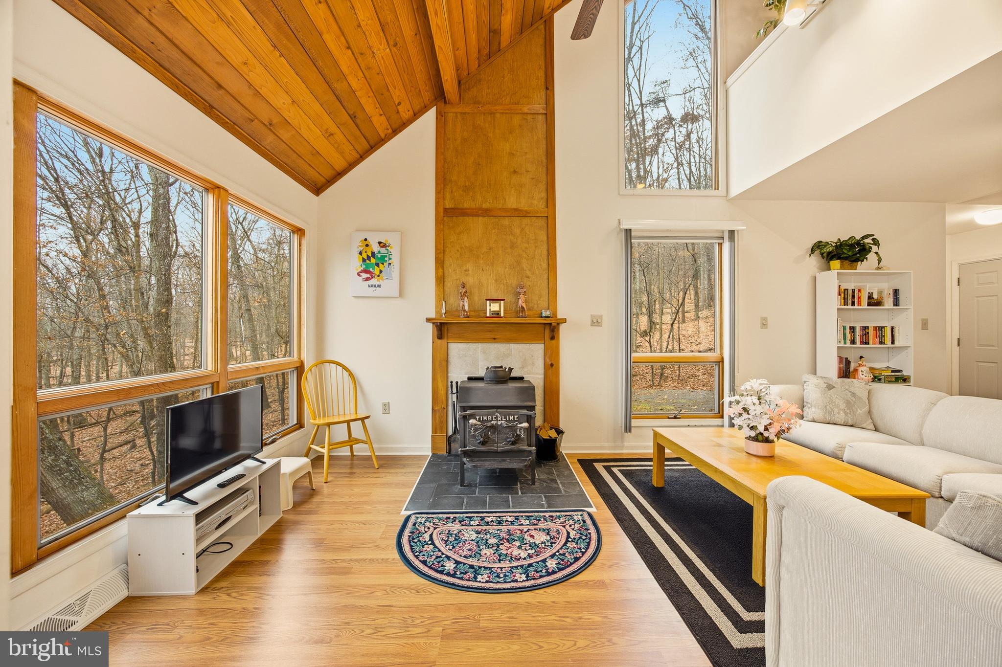 16 Gopher Trail Berkeley Springs, WV 25411 - Photo 7 of 52 a living room with furniture large window and couch