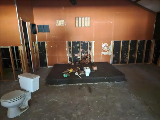 a view of living room with furniture and wooden floor