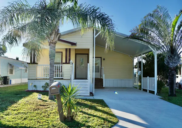 a view of a house with a patio