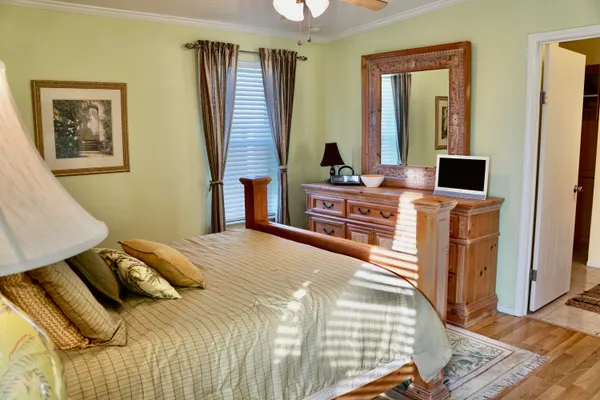 a bedroom with a bed and furniture