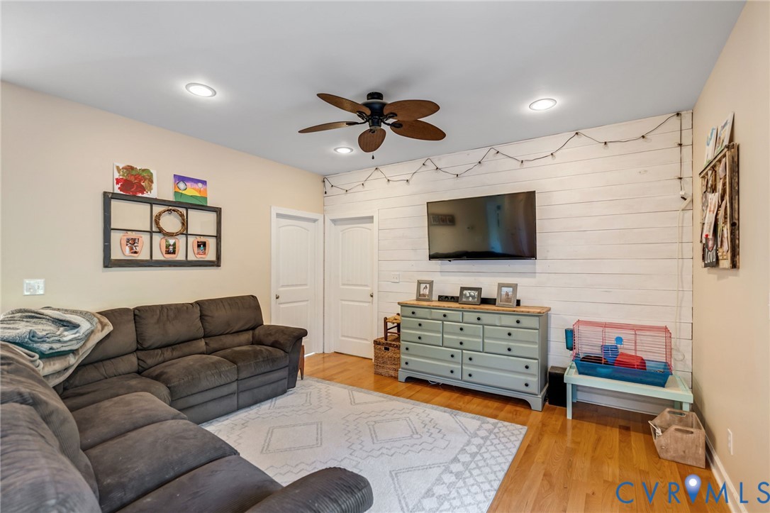338 Thessalonia Road Bremo Bluff, VA 23022 - Photo 14 of 50 a living room with furniture and a flat screen tv