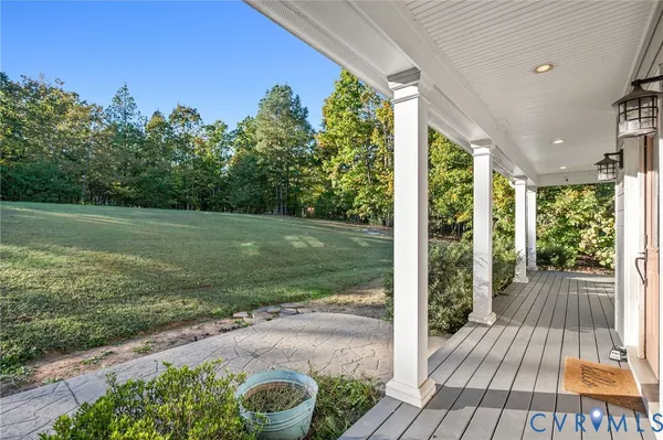 a view of a porch and garden