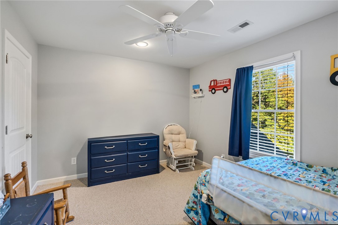 338 Thessalonia Road Bremo Bluff, VA 23022 - Photo 31 of 50 a bedroom with a bed and a window