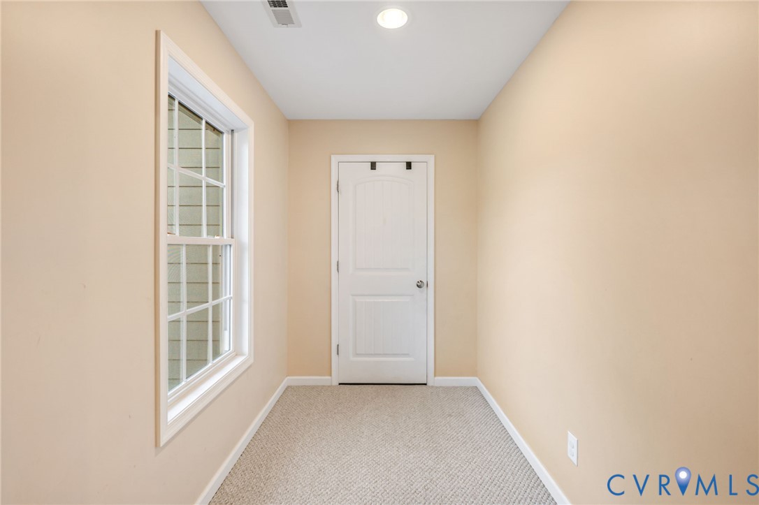 338 Thessalonia Road Bremo Bluff, VA 23022 - Photo 34 of 50 a view of an empty room with a window