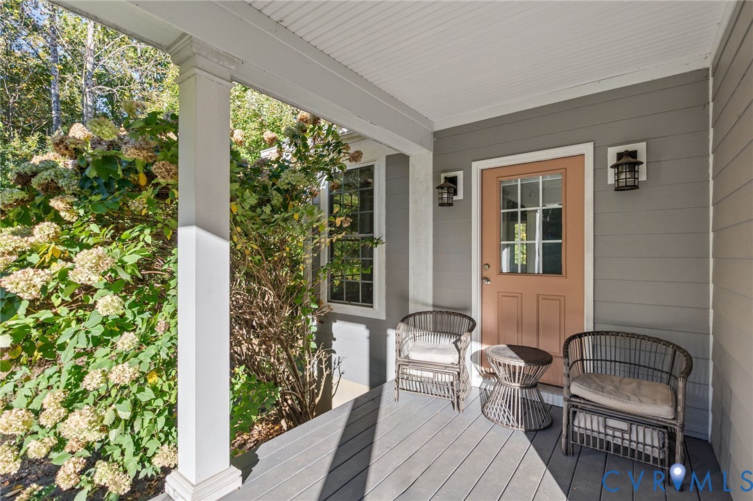 338 Thessalonia Road Bremo Bluff, VA 23022 - Photo 5 of 50 a balcony with chairs and with a potted plant