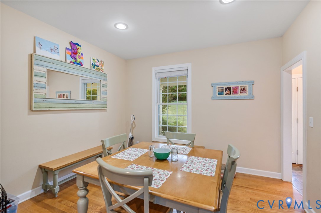 338 Thessalonia Road Bremo Bluff, VA 23022 - Photo 7 of 50 a view of a dining room with furniture a chandelier and wooden floor