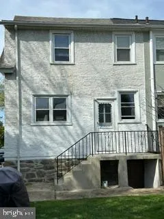 a front view of a house with yard