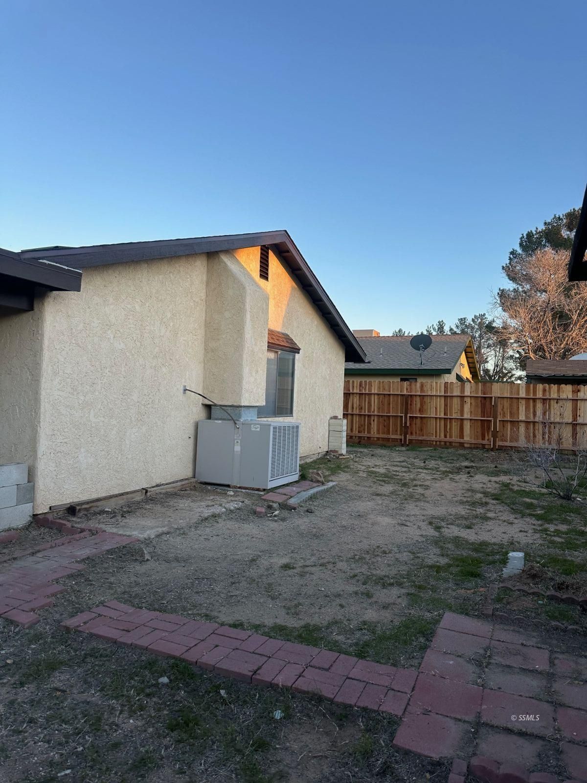 235 Richard Court Ridgecrest, CA 93555 - Photo 8 of 8 a view of a house with a backyard