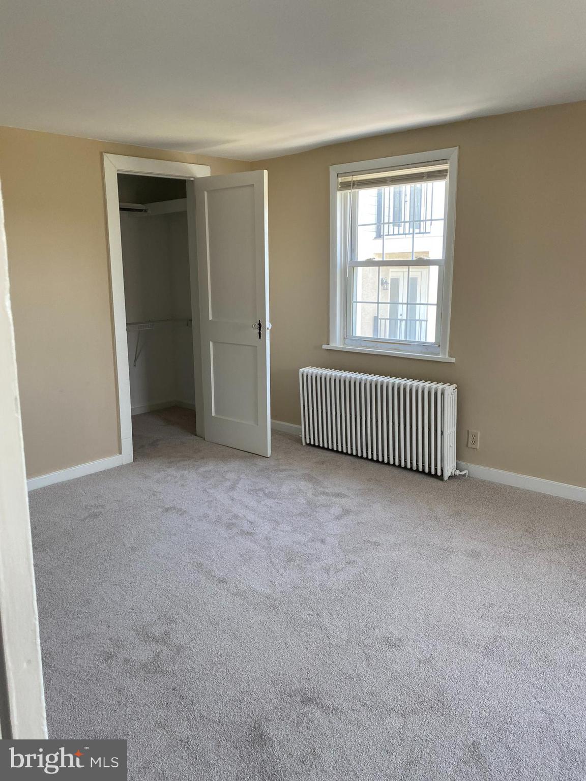 2185 Kimberton Road Phoenixville, PA 19460 - Photo 9 of 15 an empty room with windows