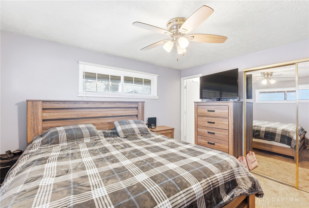 5171 Fishburg Road Dayton, OH 45424 - Photo 26 of 35 This spacious bedroom offers comfortable living with ample light and thoughtful design.