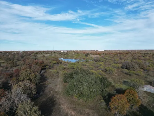 a view of a city with lots of trees