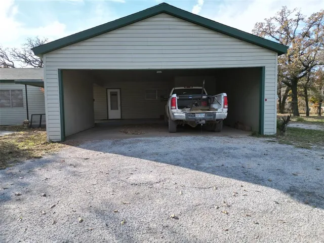 a front view of a house with a garage