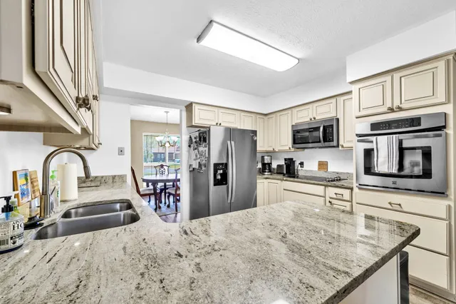 a view of a livingroom with furniture and wooden floor