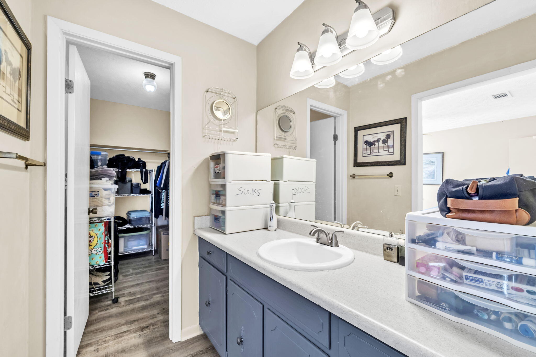 2609 Briarcliff Road Panama City, FL 32405 - Photo 22 of 41 a bathroom with a sink double vanity and a mirror