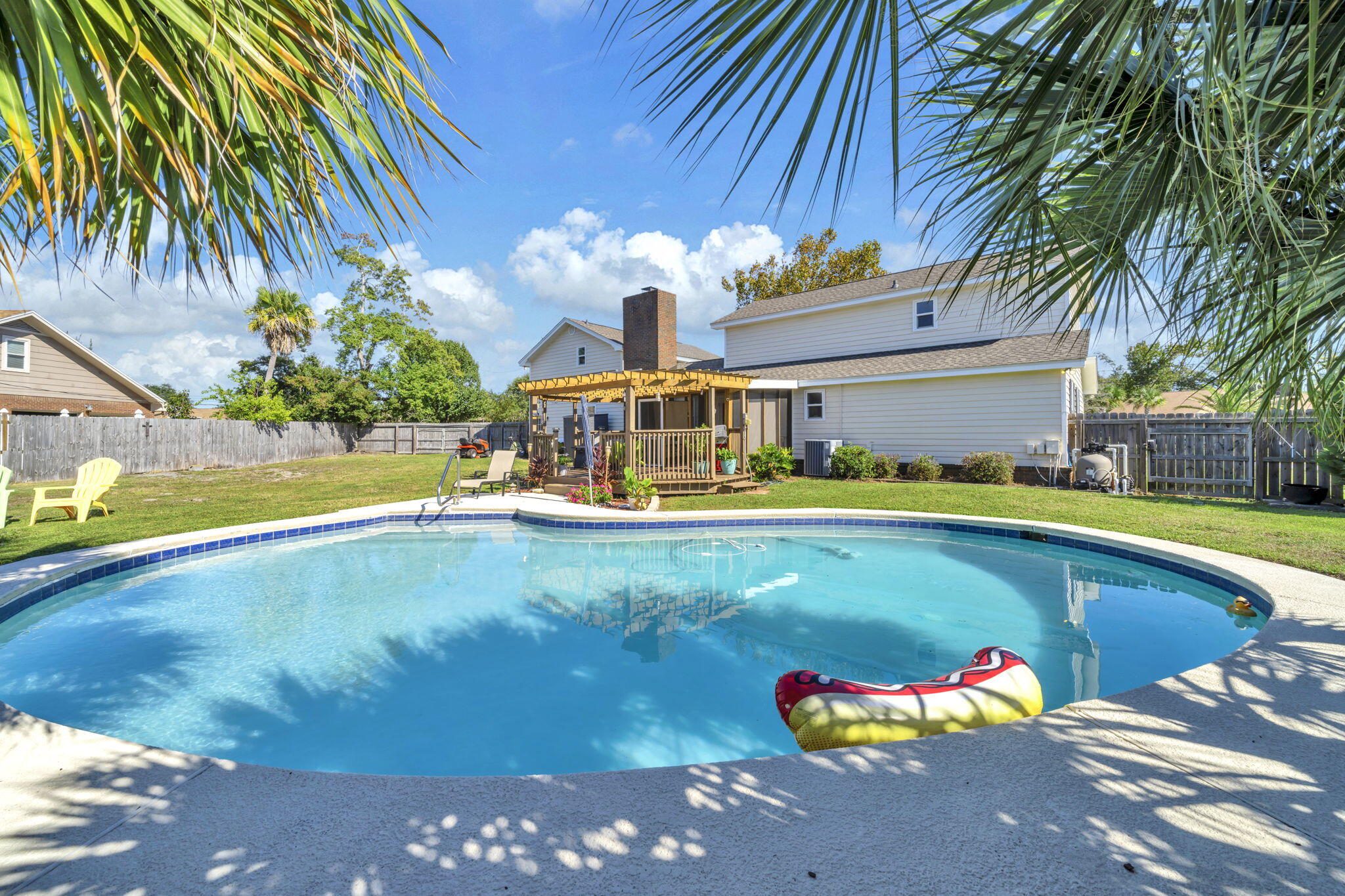 2609 Briarcliff Road Panama City, FL 32405 - Photo 3 of 41 a view of a swimming pool with an outdoor seating