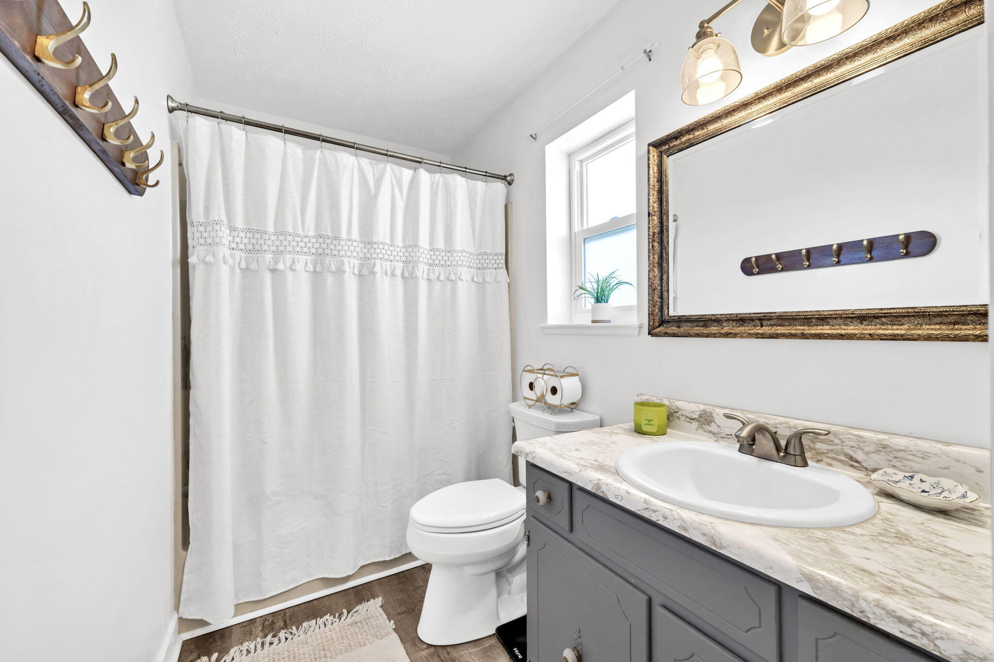 2609 Briarcliff Road Panama City, FL 32405 - Photo 33 of 41 a bathroom with a granite countertop sink and a mirror