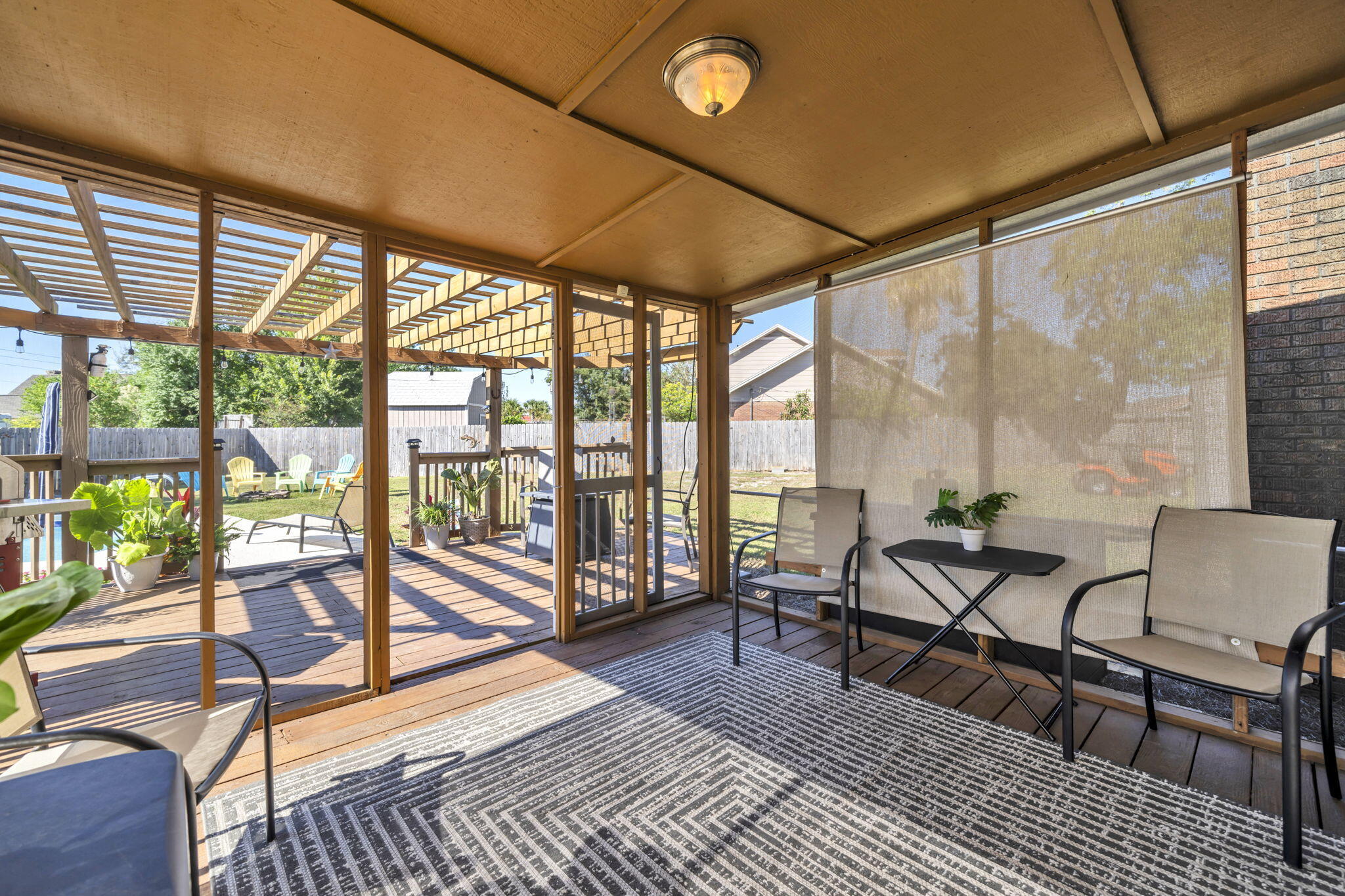 2609 Briarcliff Road Panama City, FL 32405 - Photo 36 of 41 a living room with furniture and a floor to ceiling window