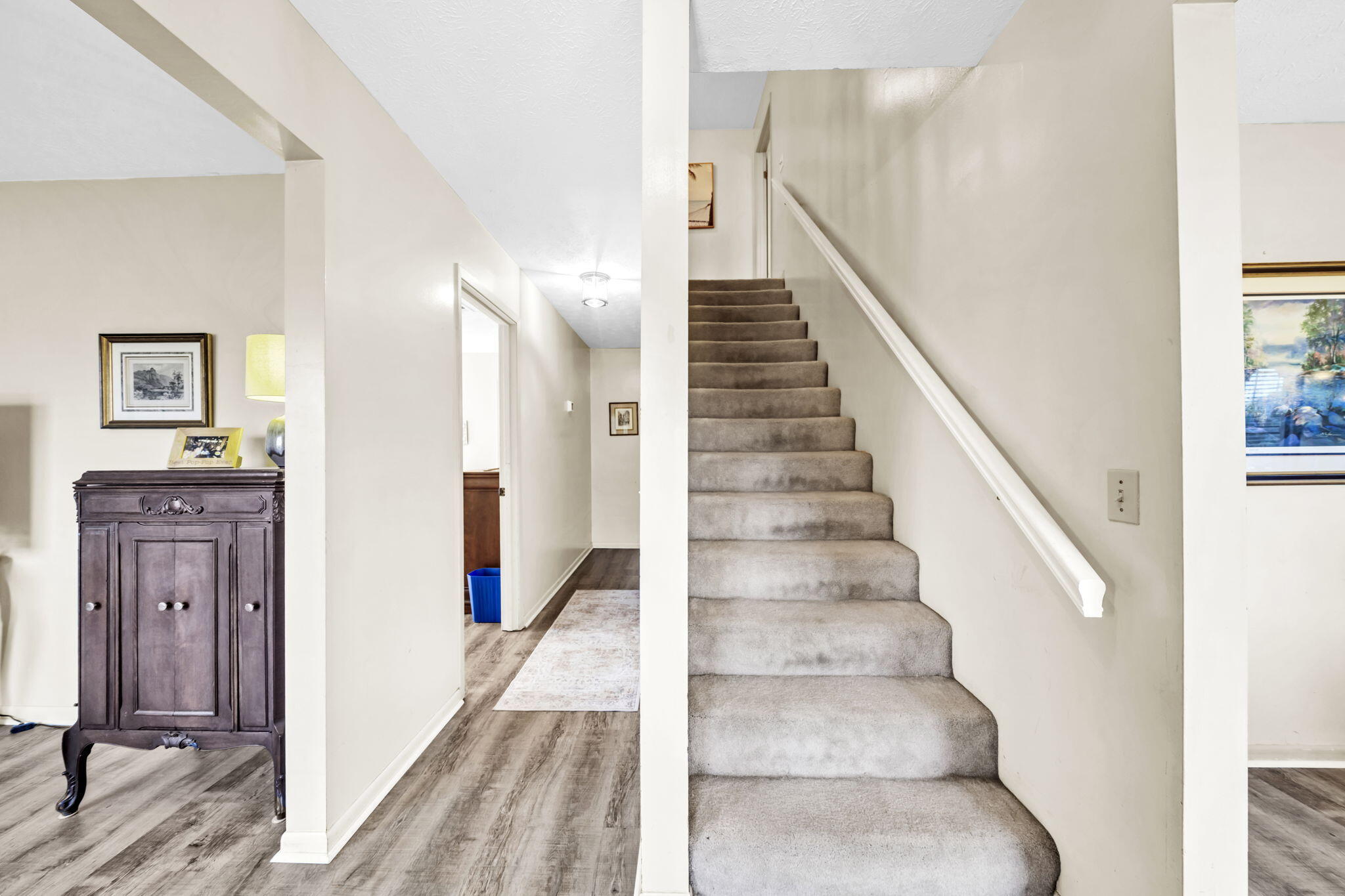 2609 Briarcliff Road Panama City, FL 32405 - Photo 9 of 41 a view of a hallway with wooden floor and entryway
