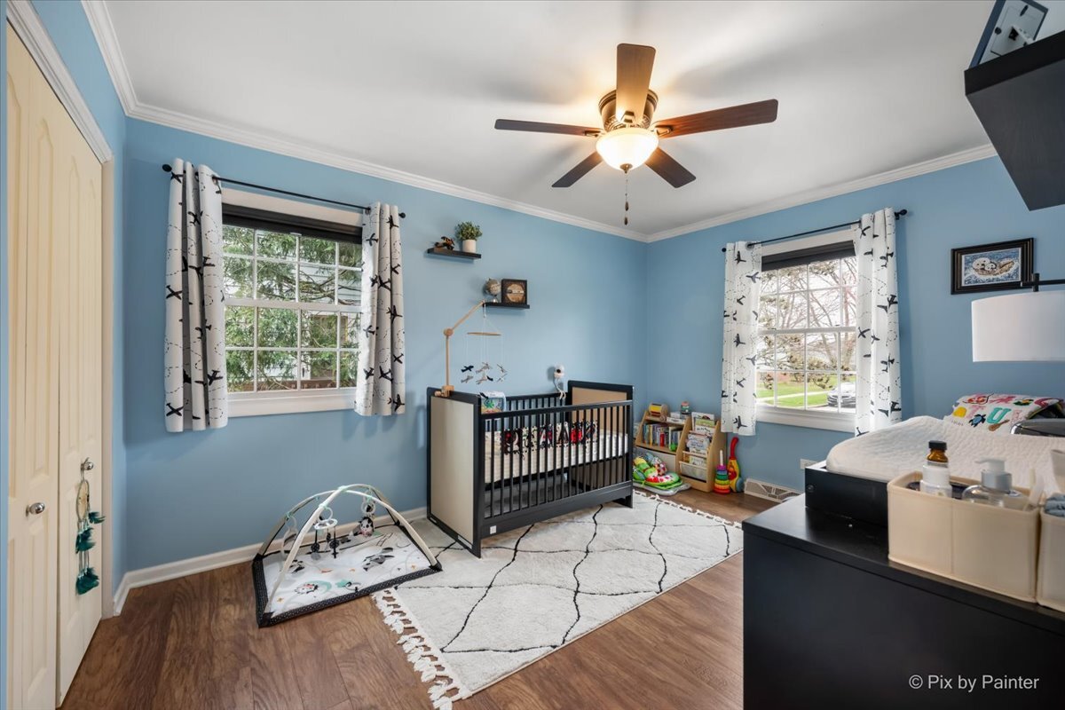 647 North Ridgemoor Avenue Mundelein, IL 60060 - Photo 22 of 39 a bedroom with furniture and a window