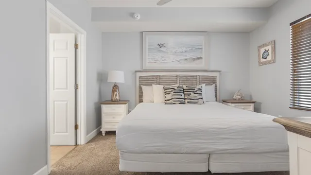 a bathroom with a shower a toilet and a sink