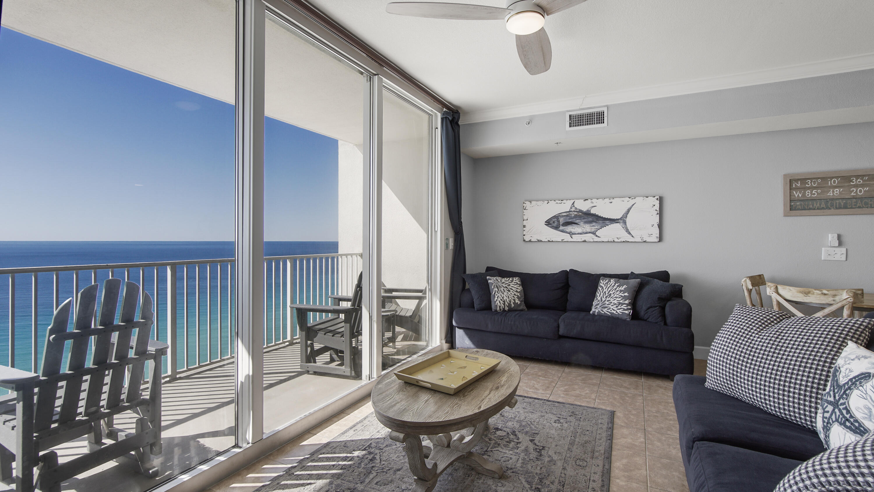 16819 Front Beach Road, Unit 1810 Panama City Beach, FL 32413 - Photo 43 of 54 a living room with furniture and a large window