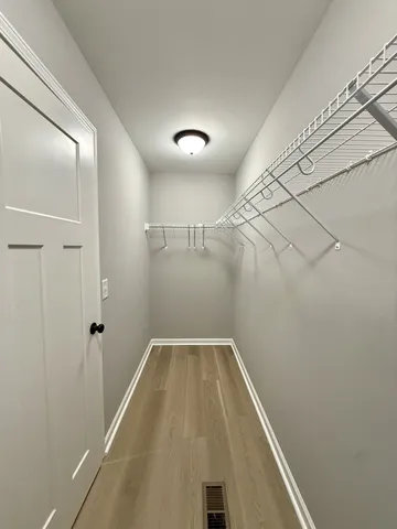 a view of a room with racks on the wall