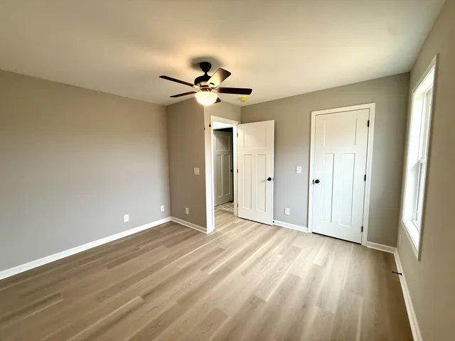 a view of a room with racks on the wall