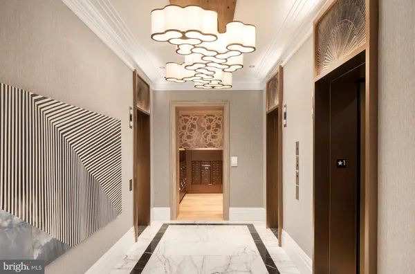 a view of entryway with chandelier