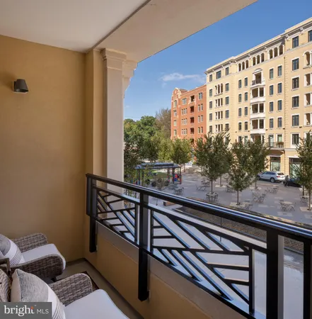 a view of balcony with furniture