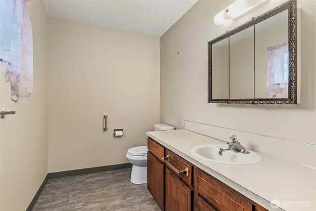 a view of a chairs and table in a outdoor space