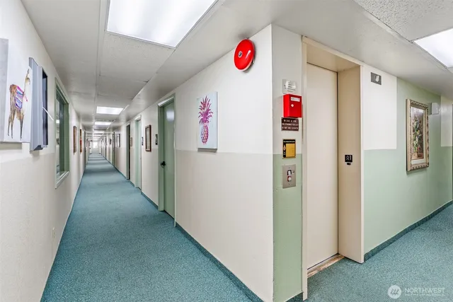 a view of a hallway with closet