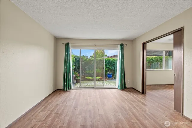 a view of entryway with wooden floor