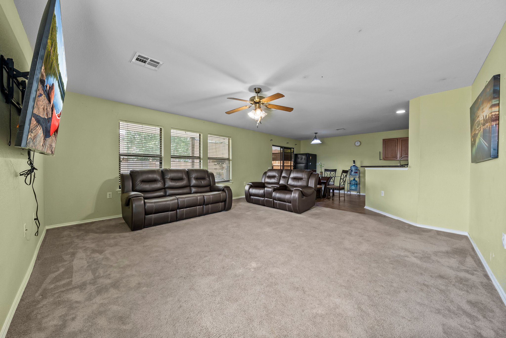 6829 Walkup Lane Austin, TX 78747 - Photo 3 of 18 A spacious living room offering comfort and functionality, perfect for everyday relaxation and entertaining.