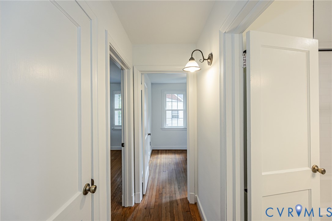 1312 Santa Rosa Road Henrico, VA 23229 - Photo 27 of 54 Hallway featuring Hardwood Flooring, White Paneled