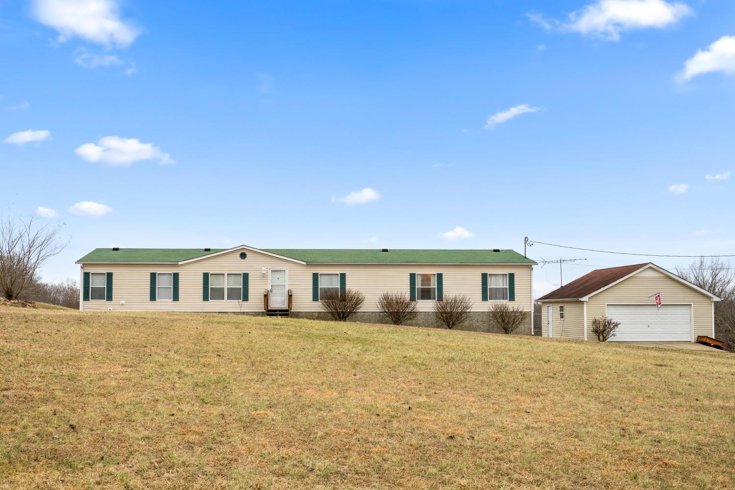 2448 Graham Cemetery Road Clarksville, TN 37043 - Photo 1 of 24 a view of house with yard and sitting area