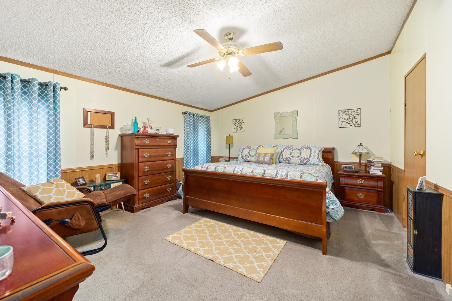 2448 Graham Cemetery Road Clarksville, TN 37043 - Photo 10 of 24 a bedroom with furniture and a window