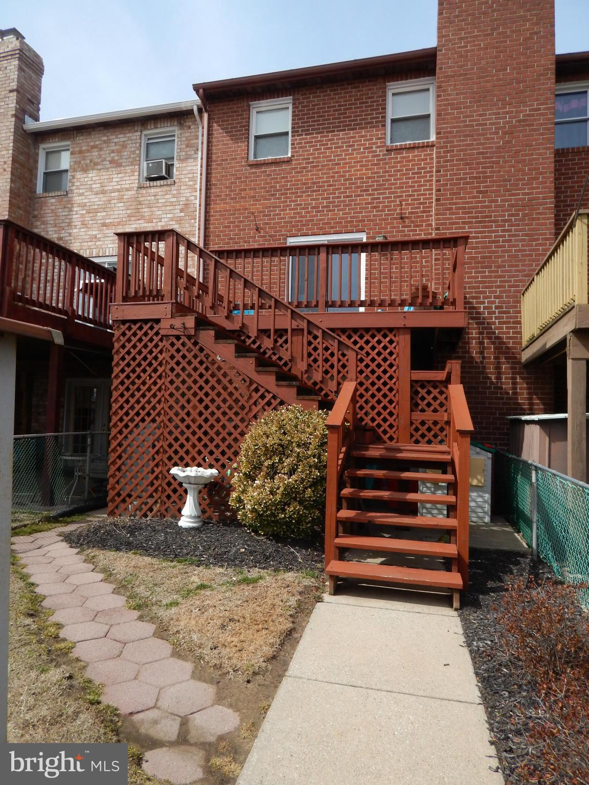 1591 Lynch Road Baltimore, MD 21222 - Photo 22 of 22 a front view of a house with a yard