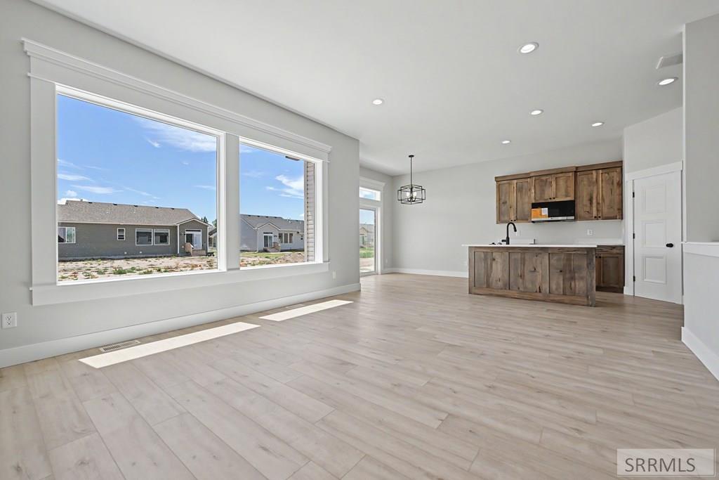 3162 Elixir Road Ammon, ID 83406 - Photo 2 of 13 Great Room to Kitchen/Dining Area