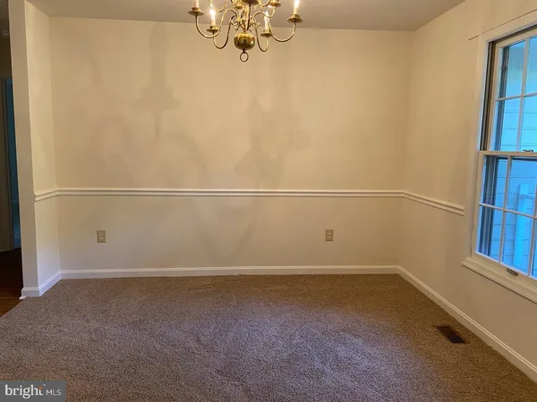 a view of a room with rack on the wall