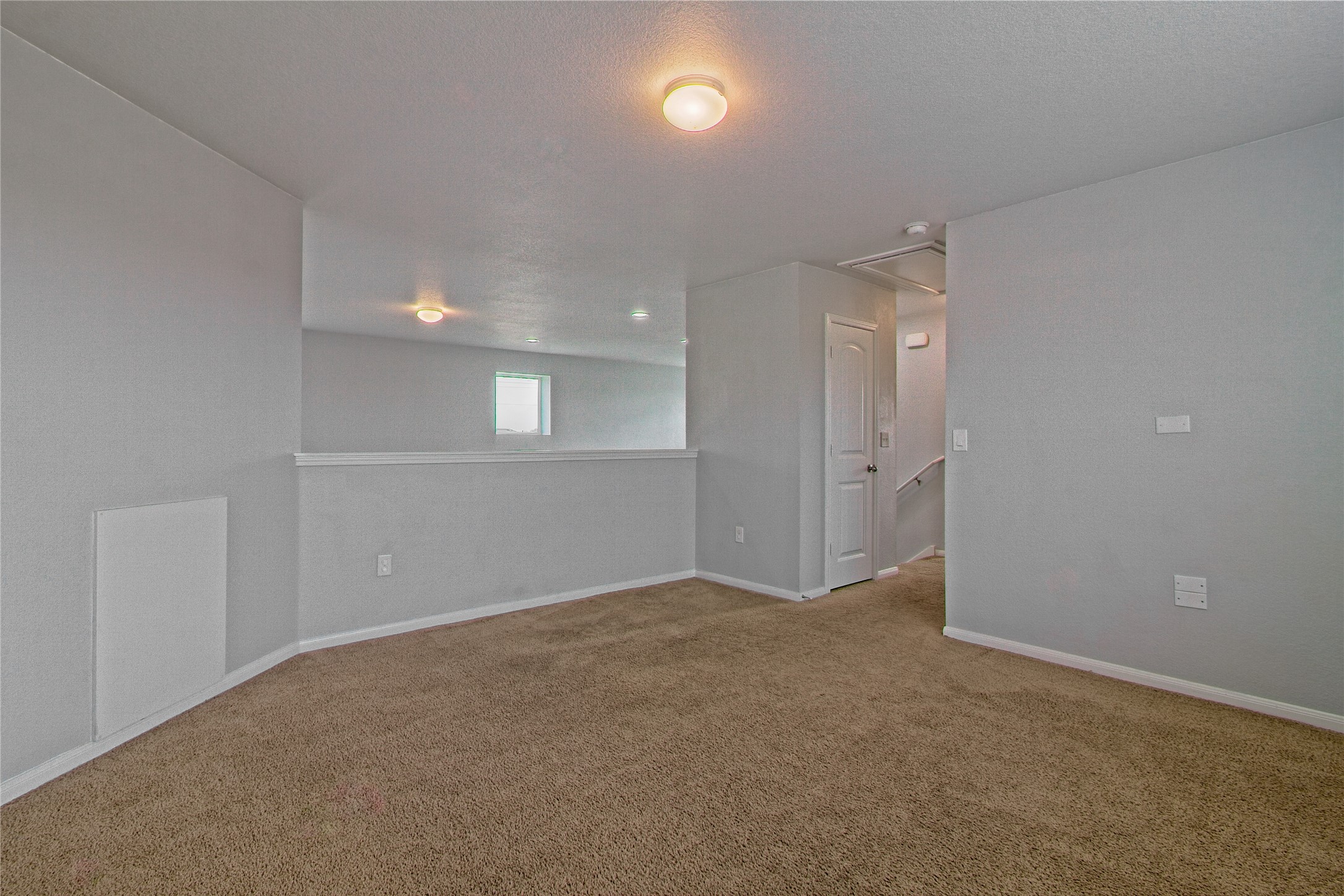 3408 Tilmon Ln. Austin, TX 78725 - Photo 24 of 35 Carpeted spare room featuring baseboards