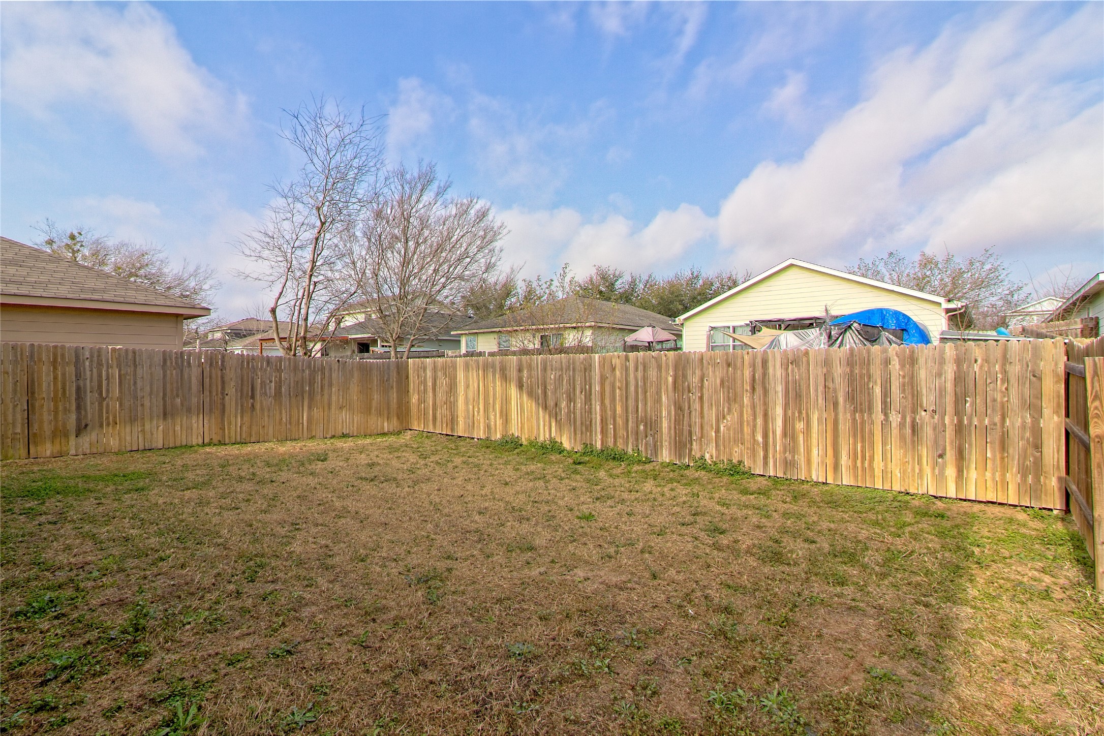 3408 Tilmon Ln. Austin, TX 78725 - Photo 31 of 35 View of fenced backyard