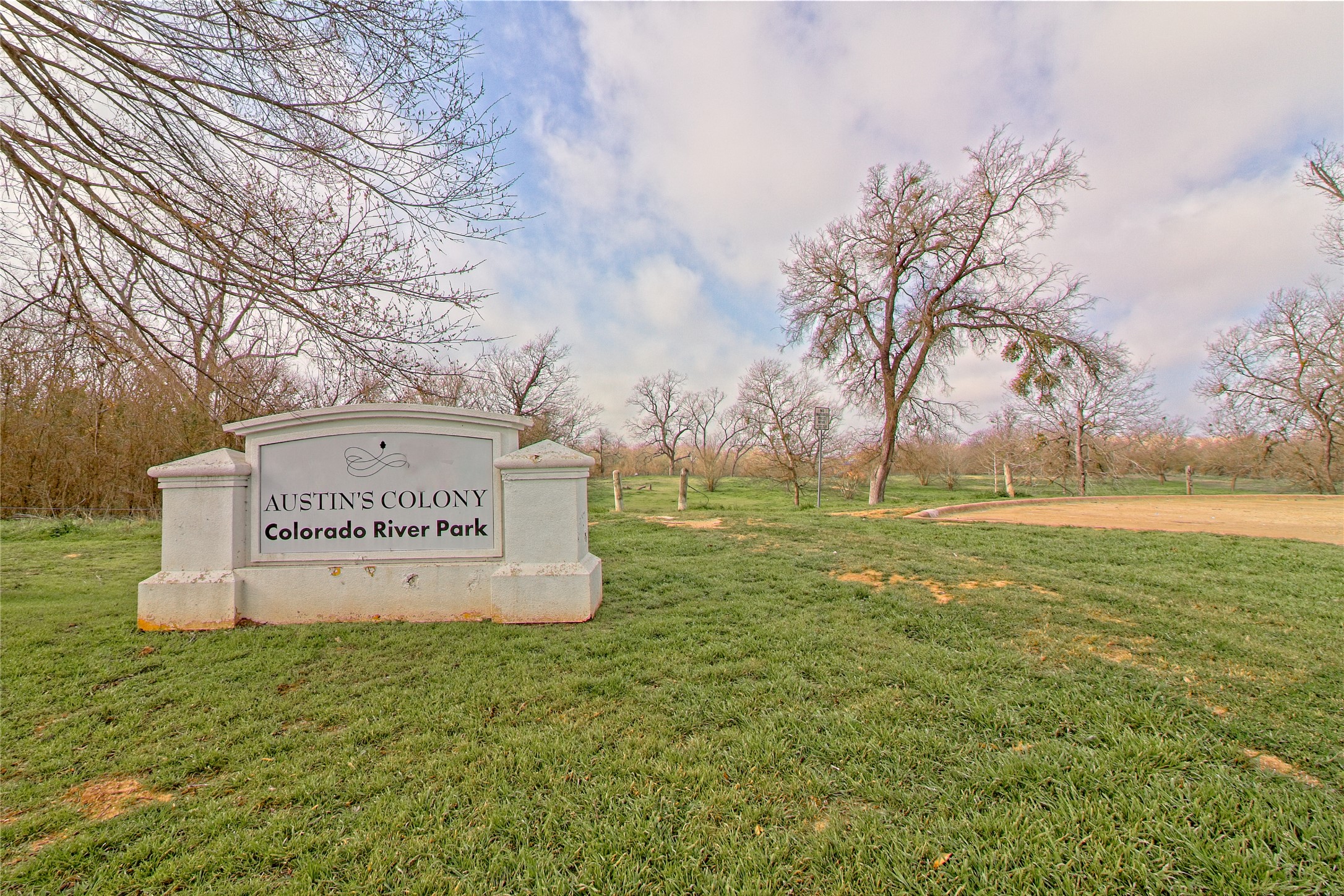 3408 Tilmon Ln. Austin, TX 78725 - Photo 33 of 35 Community sign with a yard